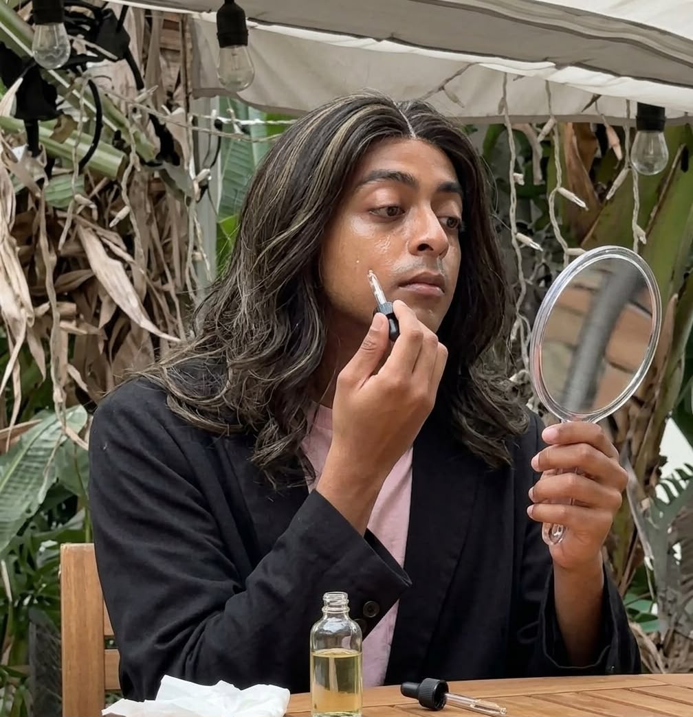 Before: Salim as Maria, wig on